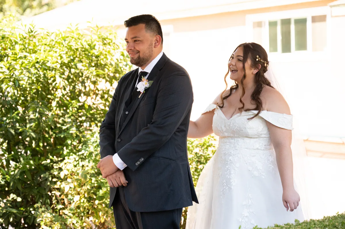 Emotional first look moment between bride and groom
